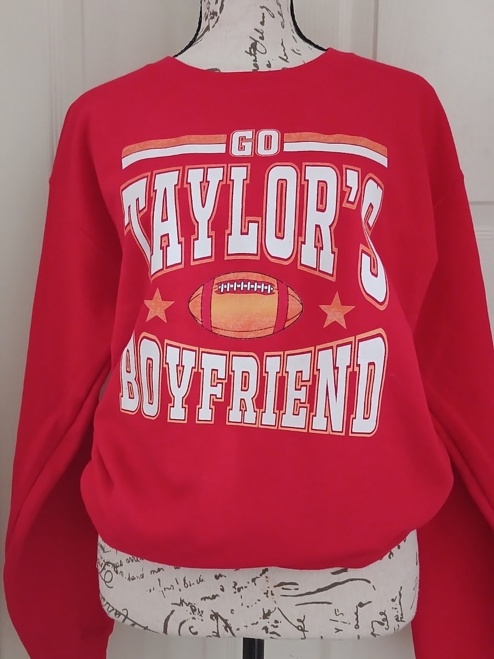 Gildan Red Crewneck Sweatshirt with 'Taylor's Boyfriend' Football Graphic